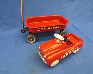 Lot 460. Small-scale McCormick Farmall pedal car and wagon