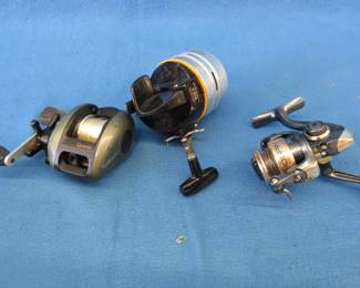 Lot 95. Three old fishing reels