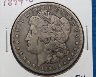 Lot 354. 1894 O Morgan silver dollar