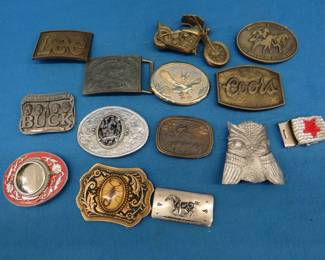 Lot 126. Thirteen belt buckles including a Buck Knife, Federal, Lee, and more