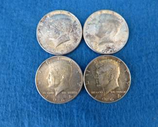 Lot 37. Four 1964 Kennedy silver half dollars