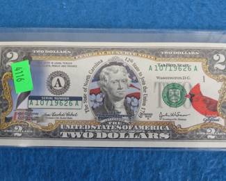 Lot 249. $2.00 bill with color overlay featuring the State of North Carolina