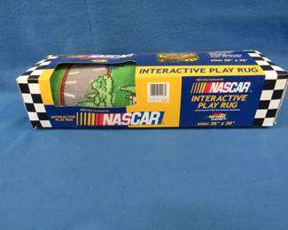 Lot 486. NASCAR play rug.&nbsp; 39" x 36".