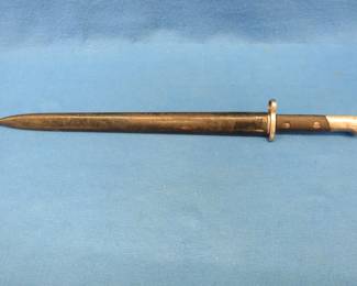 Lot 19. Sword bayonet Model FN 1924.&nbsp; Total length just over 20".&nbsp; Blade length 15".&nbsp; Still has factory edge.