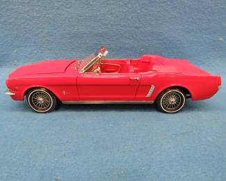 Lot 216. Ford Motor Co. 1964 1/2 Ford Mustang convertible.&nbsp; 1:18 scale die-cast car with box.