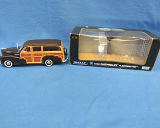 Lot 369. Welly 1948 Chevrolet Fleetmaster Woody Wagon.&nbsp; 1:18 scale die-cast and plastic car with box.