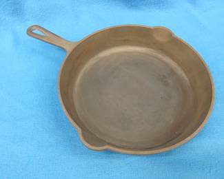 Lot 238. Cast iron {#}8 10 1/2" O'Brien & O'Brien frying pan