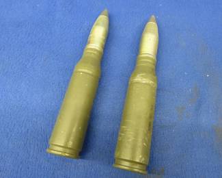 Lot 211. Two 25mm Dummy rounds