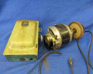 Lot 75. General Electric 1/6-HP motor with wire wheel and a Square D safety switch
