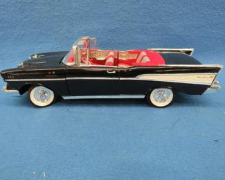 Lot 217. American Muscle 1957 Chevrolet Bel Air convertible.&nbsp; 1:18 scale die-cast car with box.&nbsp; Box has some condition issues.