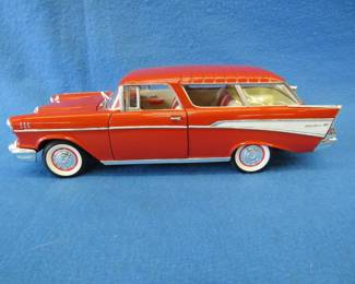 Lot 64. Road Legends 1957 Chevrolet Nomad.&nbsp; 1:18 scale die-cast car with box.&nbsp; One wiper bent.