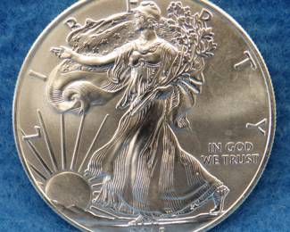 Lot 473. 2015 American Silver Eagle.&nbsp; One troy ounce of .999 fine silver