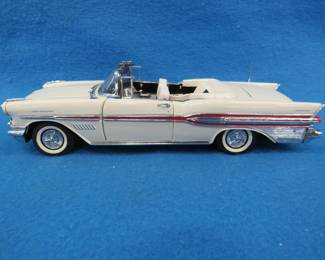 Lot 451. Franklin Mint 1957 Pontiac Bonneville convertible.&nbsp; 1:18 scale die-cast car.