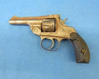 Lot 308. Old .22 revolver possibly a Harrington and Richardson.&nbsp; For parts or repair.&nbsp; NSN