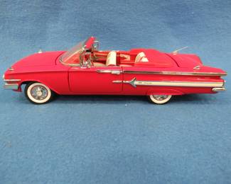 Lot 455. Franklin Mint 1960 Chevrolet Impala convertible.&nbsp; 1:18 scale die-cast car.