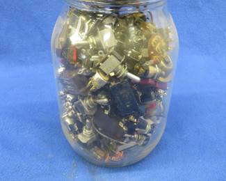 Lot 143. 1-gallon jar of switches