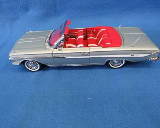 Lot 62. Sun Star 1961 Chevrolet Impala convertible.&nbsp; 1:18 scale die-cast car.&nbsp; Includes box.
