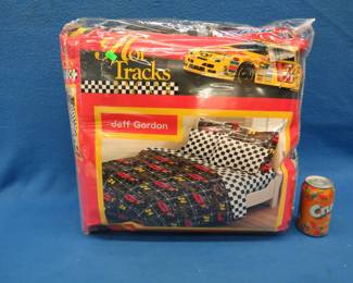 Lot 270. Jeff Gordon full/queen size comforter. Appears new in the package.