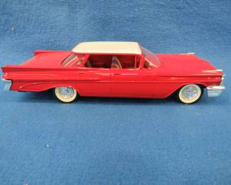 Lot 466. Memory Models 1959 Pontiac Bonneville.&nbsp; Plastic promo dealer car.
