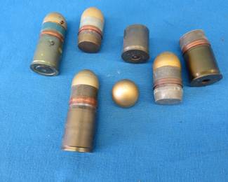Lot 57. Inert 40mm cases and test projectiles