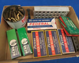 Lot 192. RCBS reloading dies, Vintage ammo boxes with empty casings, and more