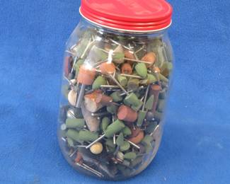 Lot 56. One-gallon glass jar glass jar filled with rotary-tool attachments, most appear to be extra fine stones