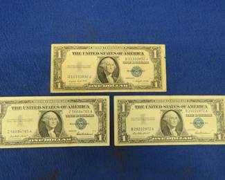 Lot 407. Three $1 Silver Certificates