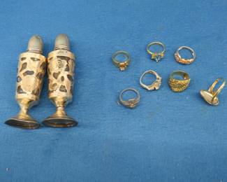 Lot 124. Seven rings, salt and pepper set, and bracelets including one sterling silver (8.11 grams)