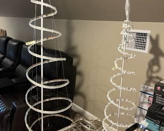 Contemporary lighted Christmas trees