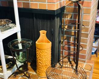 Wrought iron hurricane candle stands, Norwegian carved wooden bucket, wire basket