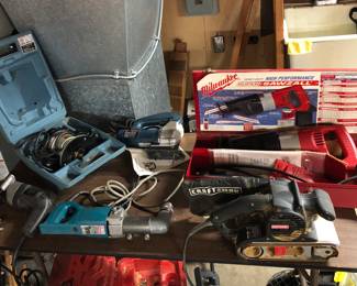 More power tools: Milwaukee Super Sawzall, Black & Decker 3”x21” belt sander w/ case, Makita 1/2” angle drill, Bosch jig saw, B & D 7630 router kit, B & D 1/2” VSR Holgun drill