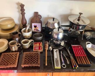Fondue sets & chafing dish, studio pottery mugs, tall wood pepper grinder
