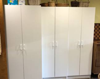 White laminate cabinets (left one is big: 30”W, 25”D, 69”H, 2 right ones: 24”W, 15.5”,D, 69”H)