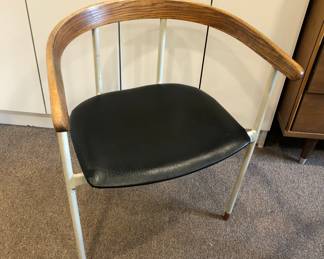 Close up of chair - black vinyl seat