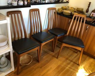 Set of 4 Benny Linden teak dining chairs with black vinyl seats