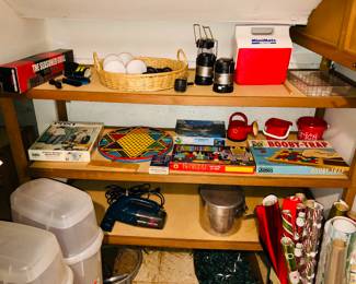 A few vintage board games, cooler, camping cook pot, gift wrap