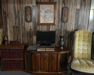 encyclopedia bookcase w/complete book set, crushed velvet rattan armchair, mid century console