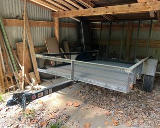$1200 - available for purchase before/during the sale. Call us for appt. 2012 5' x 8' Utility Trailer with drop down ramp. Nice trailer. Title on hand.