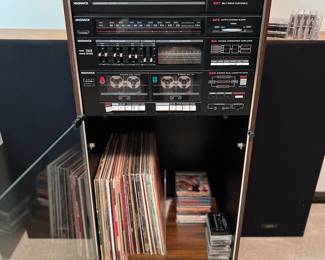 vintage stereo cabinet, albums, tapes