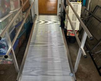 Handicap straight ramp with hand rails.  Will presell to make room .  Call Gail if interested - 314-347-9755