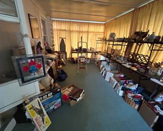 Back sun room off of kitchen has a mix or various items. Mostly vintage. Electronics, linens, ceramics, Christmas, kitchen items and housewares, ephemera, and much more