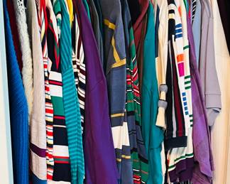 6 closets and 3 racks packed with vintage clothing 