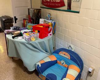 Awesome vintage Coca-Cola metal advertising sign, 51x17". Cute chair and footstool from The Land of Nod