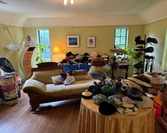 Outstanding collection of antique and vintage women’s hats, including several Victorian. 100+ of&nbsp;time periods beginning early 1910s. Stunning hand work, feathering, etc. Over a dozen fun vintage hat boxes, several of them having local Midwest shops and cities on them.
Two incredible, notable vintage hat stands, 1 black, wrought iron, standing store stand and a to-die-for 1950s lucite table top stand. Drool worthy!! Also over a dozen table top hat stands too, all vintage or antique.
