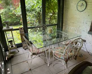 Glass-top, wrought iron table and chairs, 52x40x30"