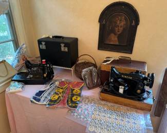 Antique Singer featherweight sewing machine with original box, both in Excellent condition
Another antique Singer portable sewing machine with case. 1930s Disney, 1930s K&L scrap sheets, vintage child hangers, vintage trim
