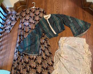 1930s, 40s dresses, (not pictured). Bottom right is a delicate French silk shawl.  Top left is a revolution era dress (Mary Williams Prindle) and a Victorian short jacket with incredible sleeves. Also not pictured are Victorian&nbsp;&nbsp;“bibs”, skirts , and dresses.