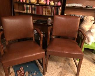 Leather and wood arm chairs