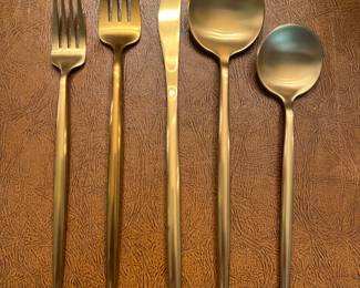 Matte gold MCM flatware
