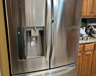Stainless Steel LG fridge side by side with lower freezer